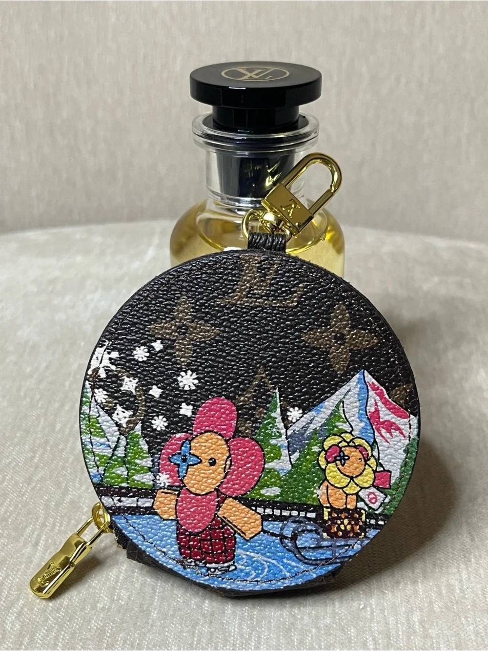 Louis Vuitton Brown Monogram Round Pouch with Colorful Winter Characters - Picture 1 of 4